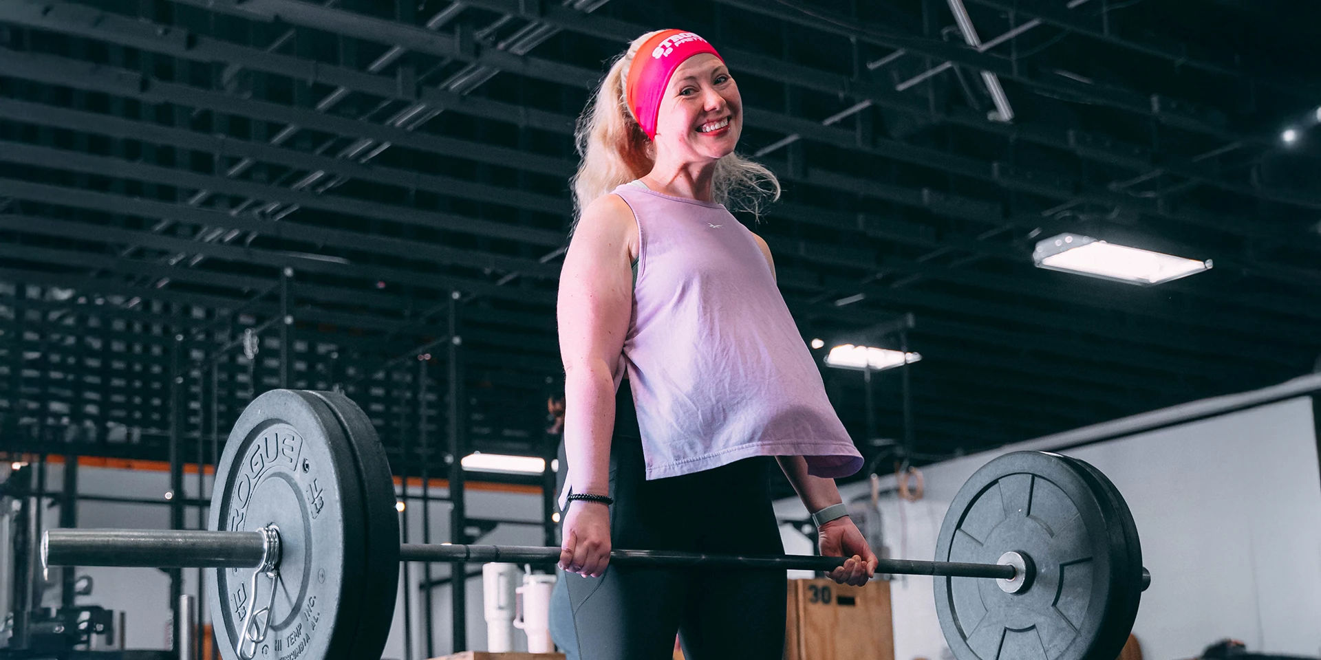 woman lifting weights at CrossFit Veneration